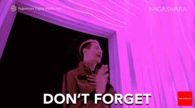 Man By Purple Wall Saying Don't Forget GIF