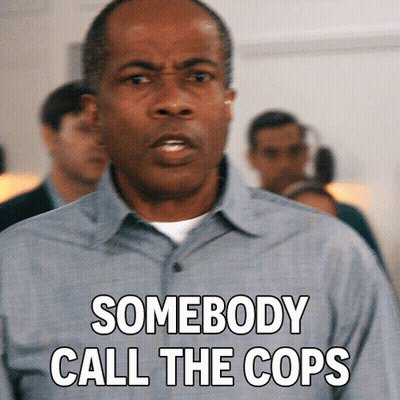 Man Calling Cops In Crowd GIF