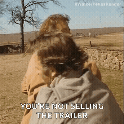 Man Carrying Another Man On His Back In Field GIF