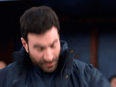 Man Carrying Another Man On Shoulders In Gym GIF