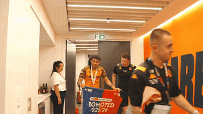 Man Carrying Banner Saying Promoted 025/26 GIF