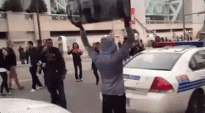 Man Carrying Car Over Head GIF