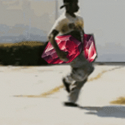 Man Carrying Large Red And Purple Item GIF