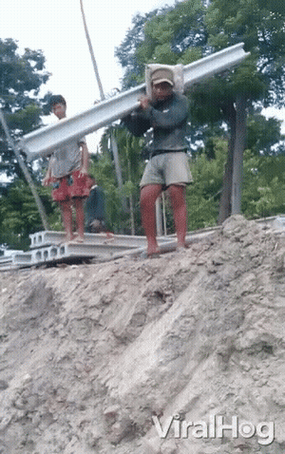Man Carrying Metal On Head Viral Hog GIF