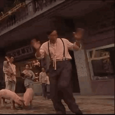 Man Carrying Pig On Back While Pig Looks On GIF