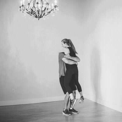 Man Carrying Woman In Arms GIF