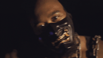 Man Carrying Woman On Back In Crowd GIF