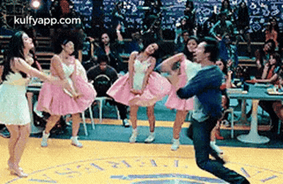 Man Carrying Women On Shoulders Dancing GIF
