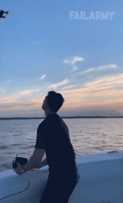 Man Catching The Drone GIF