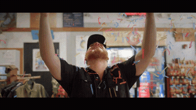 Man Celebrating With Confetti And Streamers GIF