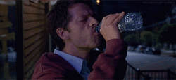 Man Chugs Drinking Water On Bottle GIF