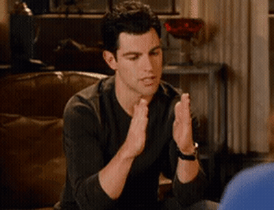 Man Clapping Hands In Living Room GIF
