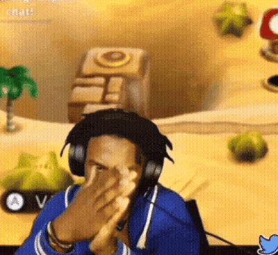 Man Clapping Headphones At Video Game GIF