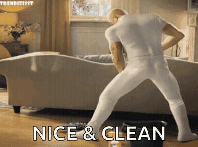 Man Cleaning Living Room Saying Nice & Clean GIF