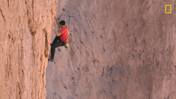 Man Climbing Mountain Alone GIF