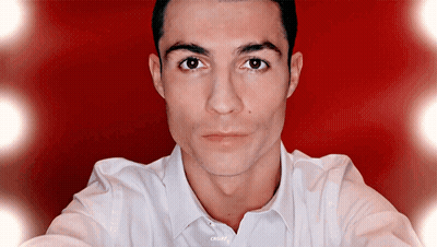 Man Close Up Red Background White Shirt Saying CR7 GIF