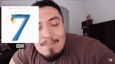 Man Closing Eyes Near Map Of The Soul 7 GIF