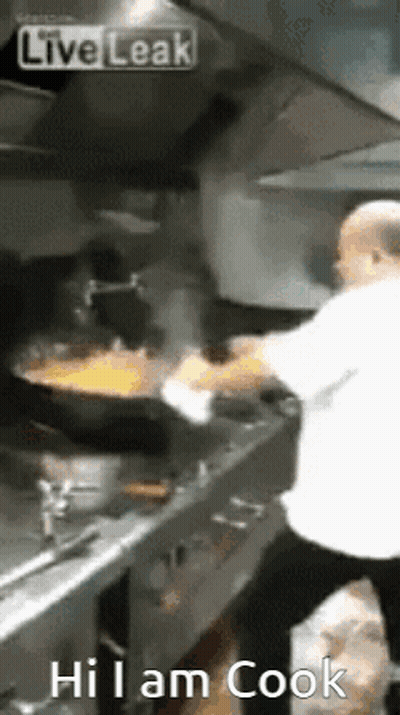 Man Cooking In Kitchen Saying Hi I Am Cook GIF