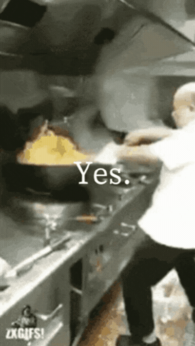 Man Cooking In Kitchen Saying Yes GIF