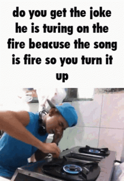 Man Cooking On Stove Talking On Phone GIF