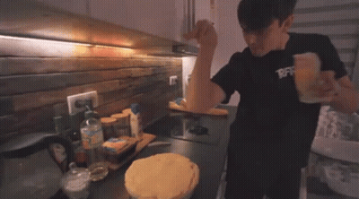 Man Cooking Pie In Kitchen GIF