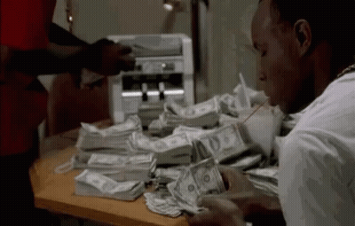 Man Counting Money On Table GIF