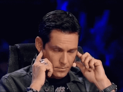 Man Covering Ears Wearing Rolex Watch GIF