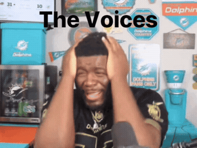 Man Covering Ears With Hands Saying The Voices GIF