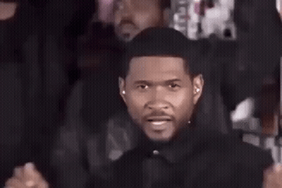 Man Covering Eyes In Front Of Men GIF
