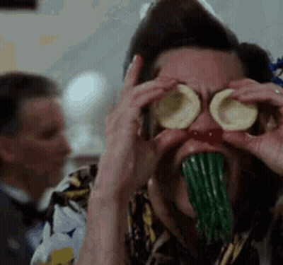 Man Covering Eyes With Sliced Potatoes Eating Green Beans GIF