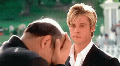 Man Covering Face As Another Looks On GIF