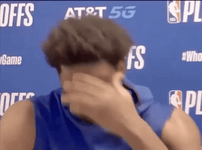 Man Covering Face In Front Of Offs Sign GIF