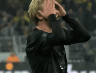 Man Covering Face On Soccer Field GIF
