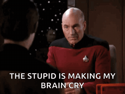 Man Covering Face The Stupid Is Making My Brain Cry