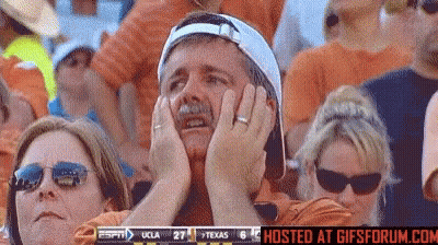 Man Covering Face Watching UCLA 27 Texas 6 GIF