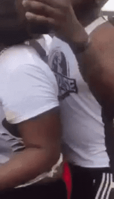 Man Covering Face While Another Looks On GIF