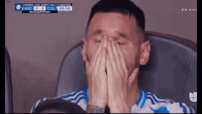 Man Covering Face While Watching Soccer Match GIF