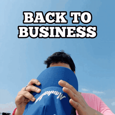 Man Covering Face With Blue Hat Saying Back To Business GIF