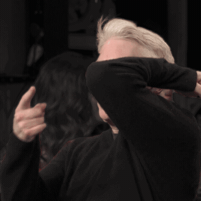 Man Covering Face With El Above GIF