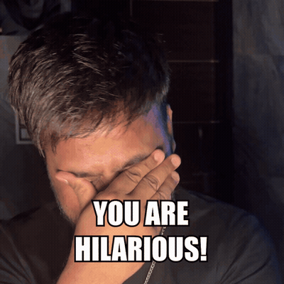 Man Covering Face With Hand Saying You Are Hilarious GIF