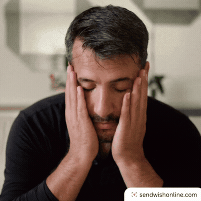 Man Covering Face With Hands GIF