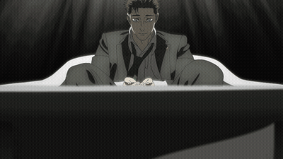 Man Covering Face With Hands In Dark Room GIF