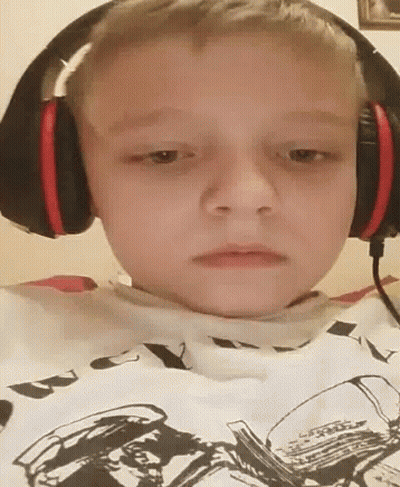Man Covering Face With Headphones GIF