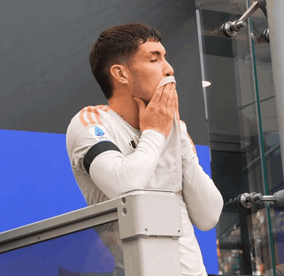 Man Covering Mouth In Serie A Jersey GIF