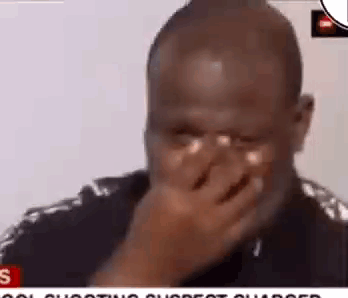 Man Covering Mouth While Crying GIF