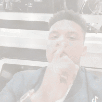 Man Covering Mouth With Finger TikTok Logo GIF