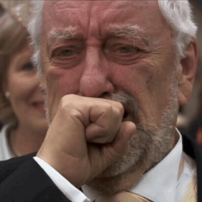 Man Covering Mouth With Hand GIF