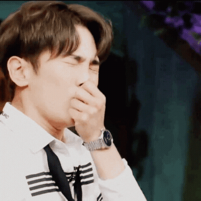 Man Covering Mouth With Hand Wearing Watch GIF