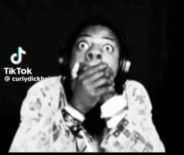 Man Covering Mouth With Headphones GIF