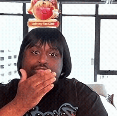 Man Covering Mouth With Join My Fan Club Sign GIF